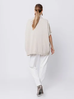 Maglia poncho collo alto