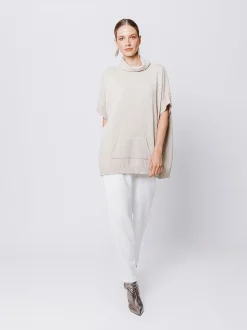 Maglia poncho collo alto