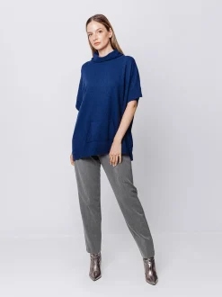 Maglia poncho collo alto