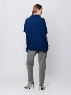 Maglia poncho collo alto