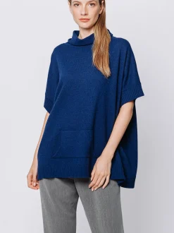 Maglia poncho collo alto