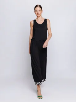 Pantalone cropped con inserto in popeline stampato