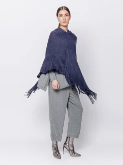 Poncho con cappuccio e frange