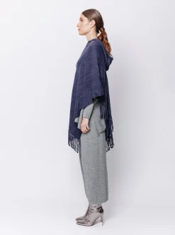 Poncho con cappuccio e frange