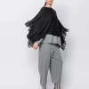 Poncho in maglia con frange