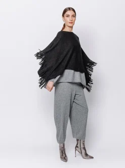 Poncho in maglia con frange