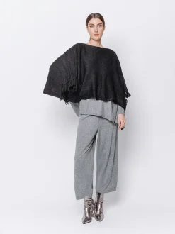 Poncho in maglia con frange