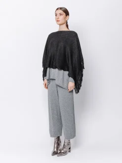 Poncho in maglia con frange