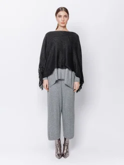 Poncho in maglia con frange