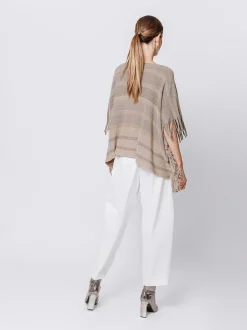 Poncho in maglia con frange