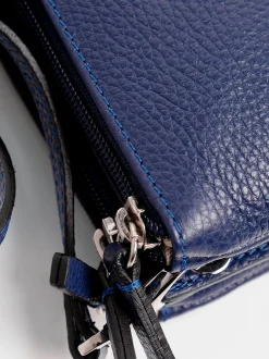 Tracolla in pelle con tre zip